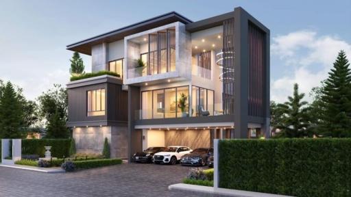 Modern two-story house with exterior lighting and parked cars