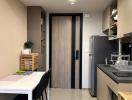 Modern kitchen with dining area and wooden finishes