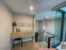 Modern Hallway with Wooden Flooring and Decorative Table