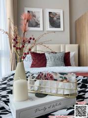 Cozy bedroom interior with decorative pillows and elegant accessories