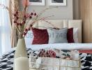 Cozy bedroom interior with decorative pillows and elegant accessories