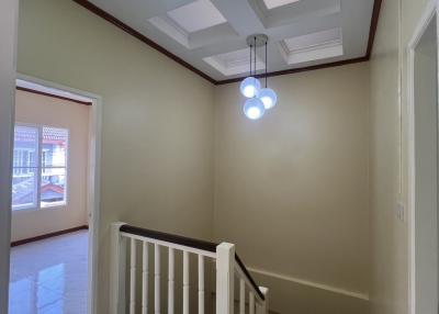 Elegant stairway with modern lighting and marble flooring