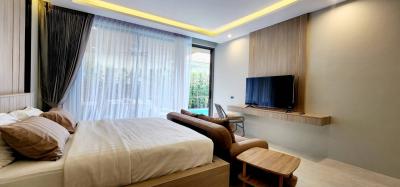 Modern bedroom with natural light and sleek design