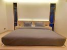 Modern bedroom with a large bed and minimalist design