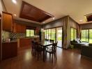 Spacious open floor plan with combined kitchen, dining, and living area