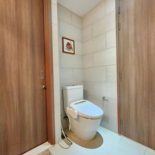 Modern small bathroom with toilet and bidet