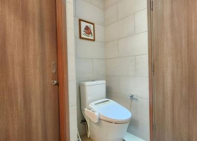 Modern small bathroom with toilet and bidet