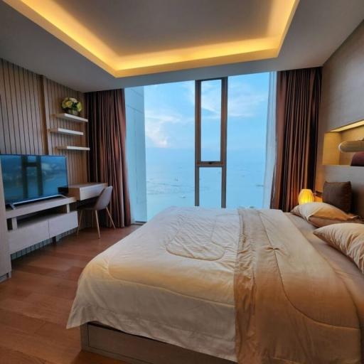 Modern bedroom with ocean view and stylish interior design