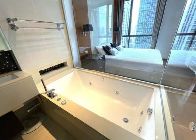 Modern bathroom with Jacuzzi tub and skyline views