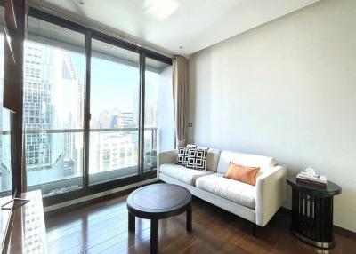 Modern living room with large windows and city view