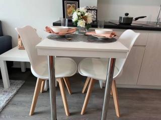 Modern kitchen with dining table