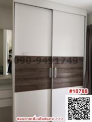 Modern bedroom with sliding wardrobe doors