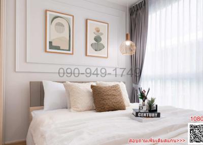 Modern bedroom interior with decorative artwork and elegant bedding