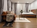 Modern bedroom interior with queen size bed, comfortable leather sofa, and decorative plants