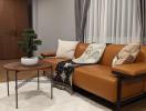 Elegant modern living room with leather sofa and wooden finishes