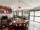 Spacious dining room with large windows and ample natural light