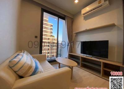 Modern living room with natural light and city view