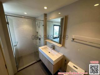 Modern bathroom with shower and vanity