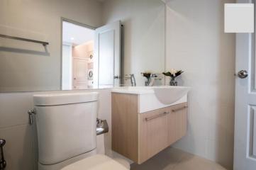 Modern bathroom with clean design and ample lighting