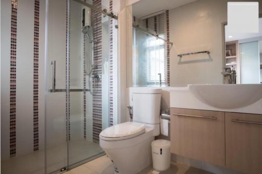 Modern bathroom with shower and vanity