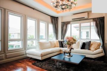 Elegant living room with natural light and modern decor