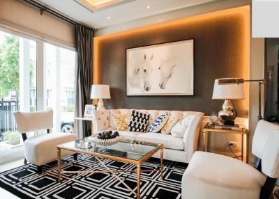 Elegant living room with modern furniture and artwork