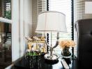 Cozy living room detail with stylish lamp and decorative items