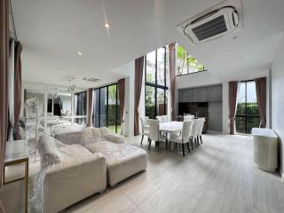 Spacious living room with modern furniture and natural light