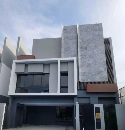 Modern two-story residential building with a unique architectural design