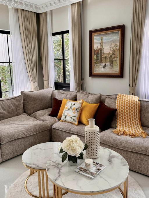 Elegant living room with natural light and modern decor