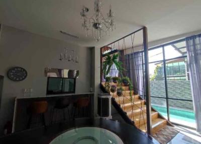 Explore this piece of Chiang Mai real estate a stunning house for sale in Nam Phrae, Hang Dong District. 5 beds, 6 baths, pool, entertainment room, and more.