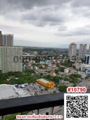 High-rise balcony view overlooking the cityscape with QR code