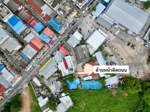 Aerial view of urban area with buildings and vegetation