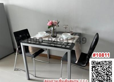 Modern dining table set with chairs and elegant tableware