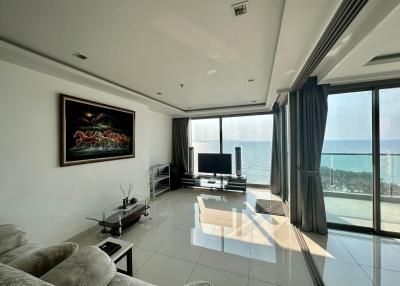 Spacious and sunny living room with ocean view