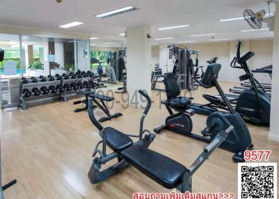 Modern gym facility with various fitness equipment