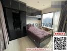 Modern bedroom with a large bed and wardrobe