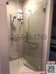 Modern bathroom interior with glass shower cubicle