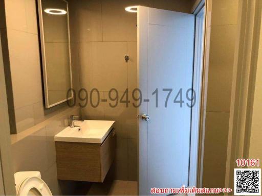 Modern bathroom with shower cabin and vanity