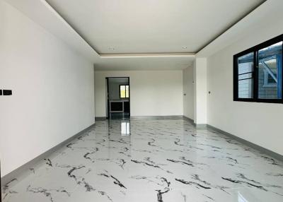 Spacious and modern living space with high gloss marble flooring