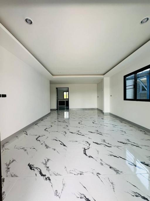 Spacious and modern living space with high gloss marble flooring