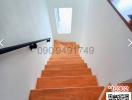 Wooden staircase with natural lighting