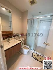 Modern bathroom interior with shower and vanity