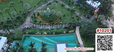 Aerial view of residential complex with pool and garden