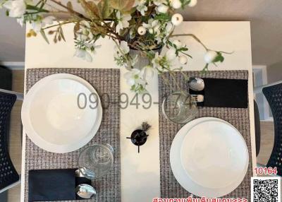 Elegantly set table in a modern dining area