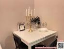 Elegant dining area with a table set and decorative candles