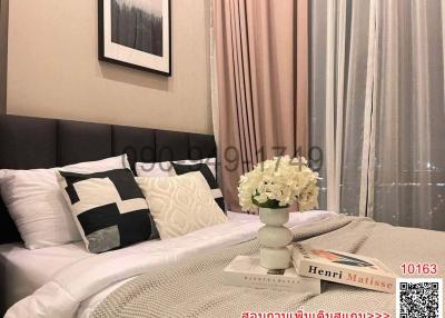 Cozy bedroom with comfortable bedding and decorative pillows