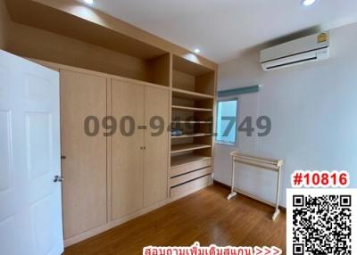 Spacious bedroom with built-in wardrobe and air conditioning