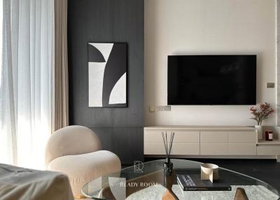 Modern living room interior with mounted television and contemporary furniture
