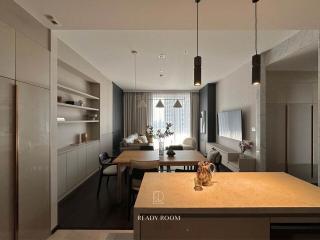 Modern living room with combined dining space and open kitchen